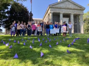Purple Flags On County Campus Honor 86 Community Members Who Died Of